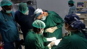 Denis and team during cataract surgery